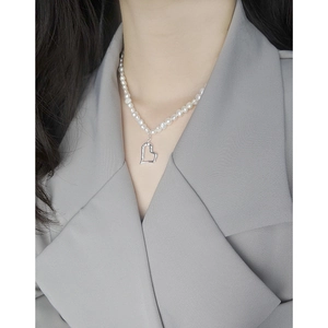 Elegant S925 sterling silver necklace with freshwater pearls and hollow heart pendant
