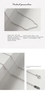 Detail of S925 sterling silver chain with spring clasp and engraved metal tag