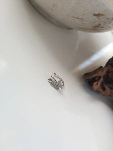 Close-up of S925 silver butterfly ear cuff with sparkling rhinestones and no piercing