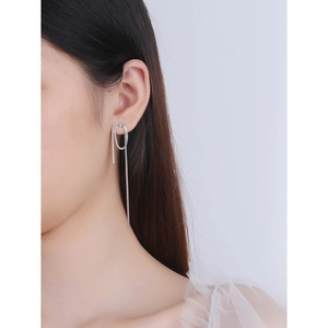 Minimalist S925 sterling silver long box chain tassel earrings shown on a model