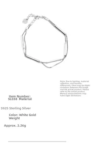 Detail of S925 sterling silver double-layer bracelet with bar links and heart charm