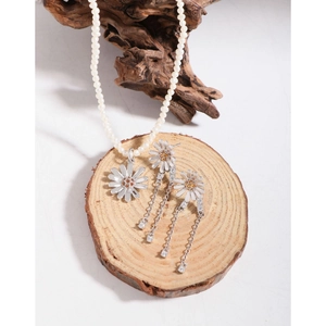 Silver daisy pendant necklace with natural pearl and matching tassel earrings set