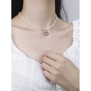 Elegant sterling silver daisy pendant necklace with small freshwater pearls for women