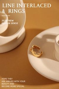 Close-up of golden interlaced line ring on white geometric props with warm lighting