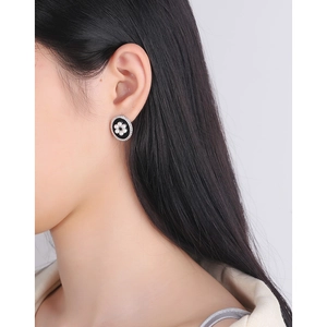 Vintage oval S925 silver stud earrings with black enamel and a small pearl flower