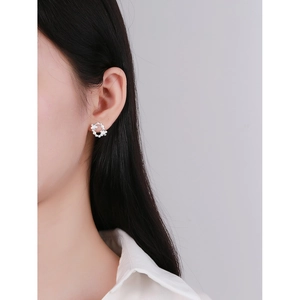 S925 sterling silver asymmetric flower hoop earrings featuring shimmering cubic zirconia