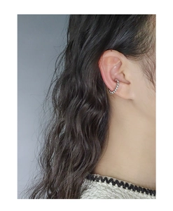 Close-up of S925 sterling silver beaded ear cuff on model for non-pierced ears