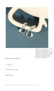 Detail of S925 sterling silver hoop earrings with irregular lines and white pearls