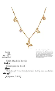 Detail der S925 Sterlingsilber Schmetterlingskette mit Champagnergold-Finish und Perlen