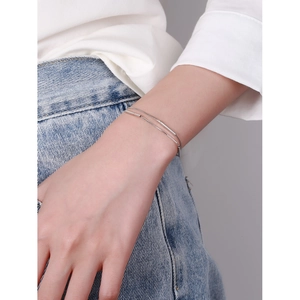Minimalist S925 sterling silver double-layer bracelet with bar charm on female wrist