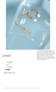 Detailed close-up of S925 sterling silver cross chain ear cuff in champagne gold finish
