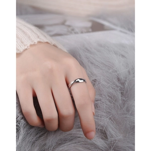 Elegant s925 silver cross twist open ring for women shown on model finger