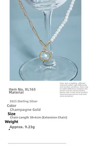 Detail of S925 sterling silver champagne gold necklace with pearl and irregular circle