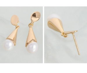 Detailed view of S925 silver ice cream cone earring with pearl and engraved hallmark