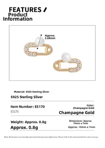 Detail view of gold S925 sterling silver safety pin earrings with pearls and crystals