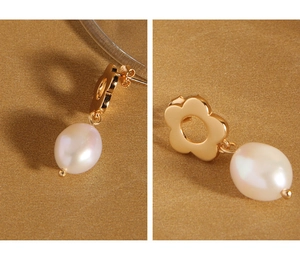 Macro detail of gold flower earrings with white pearls and S925 silver studs