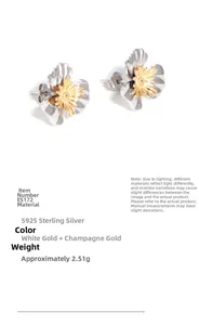 Detail view of S925 sterling silver flower earrings with white gold and champagne gold finish