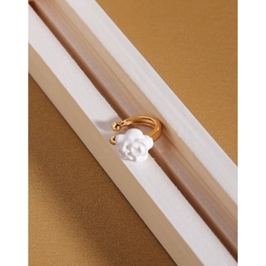Minimalist S925 sterling silver camellia ear cuff with white enamel and golden plating