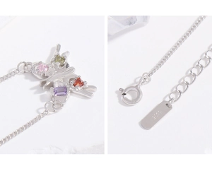 Macro shot of S925 sterling silver butterfly pendant with colorful zircon stones