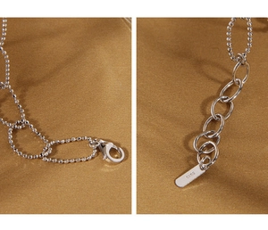 Detail of S925 sterling silver bead chain with lobster clasp and extension chain link