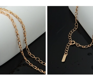 Detail of S925 silver gold necklace with five pearls, lobster clasp and extension chain