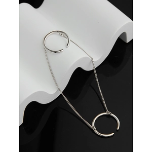 Close-up of S925 sterling silver double-layer connected ring with polished chain detail