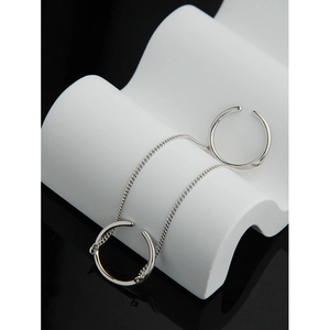 Modern S925 sterling silver double-ring ear cuff with sleek chains on white display stand