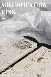 Artistic detail of Solidification S925 silver ring on marble with industrial style