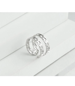 Macro view of a silver double-layered chain ring with an adjustable open back design