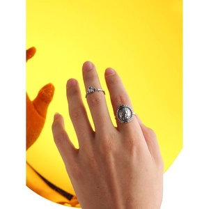 Retro S925 sterling silver stacked rings featuring oval zircon and coin relief design
