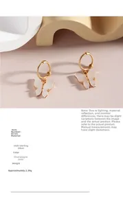 Close-up of S925 sterling silver butterfly earrings with shell inlay in champagne gold