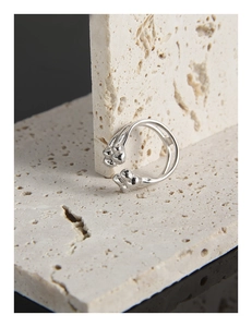 Detail of S925 sterling silver minimalist ring with open adjustable liquid metal design