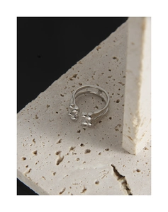 Detailed view of S925 silver double-layer open ring with liquid metal lava droplet on stone