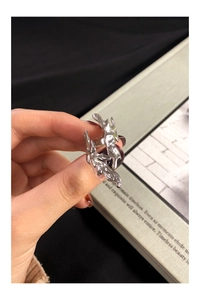 Detailed view of S925 sterling silver liquid metal flame ring with melting texture