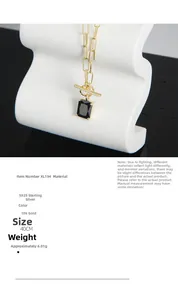 Detailed close-up of S925 silver chain with 18k gold finish and black square pendant