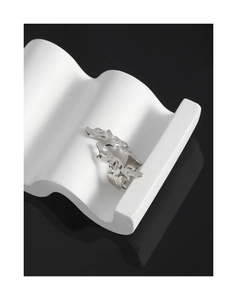 Close-up of S925 sterling silver ring with organic lava texture on wave display