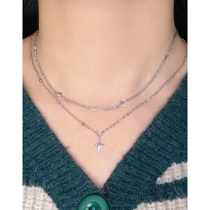 Double layer S925 sterling silver star necklace featuring asymmetric chains for women