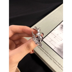 Minimalist S925 sterling silver ring with organic flame texture and adjustable open band