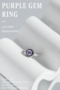 Macro view of purple cabochon zircon on textured S925 sterling silver ring