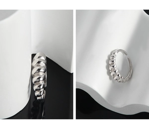 Close-up of S925 sterling silver croissant ring showing inner stamp and twist texture