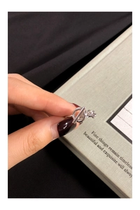 Detailed close-up of a minimalist S925 sterling silver chain ring with toggle clasp closure