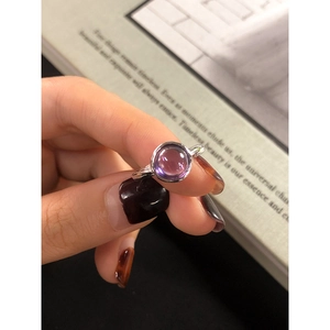 Minimalist S925 sterling silver ring featuring an irregular texture and purple zircon stone