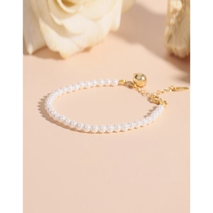 Bracelet élégant en perles et argent S925 avec breloque cloche dorée et chaînette