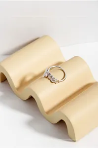 Detailed close-up of S925 sterling silver chain ring with minimalist OT buckle design