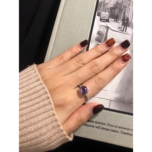 Minimalist S925 sterling silver ring with round purple zircon on a polished silver band