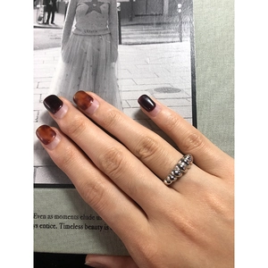 Minimalist S925 sterling silver croissant dome ring with a polished spiral bead design