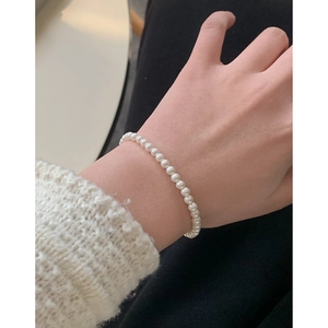 Élégant bracelet en perles d'argent sterling S925 avec clochette au poignet