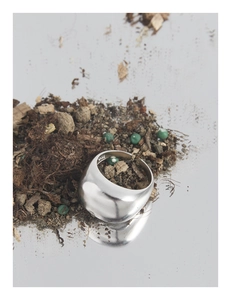 Macro detail of polished S925 sterling silver ring showing the inner material hallmark