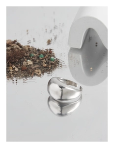 Detailed macro view of the S925 sterling silver stamp on a minimalist polished open ring