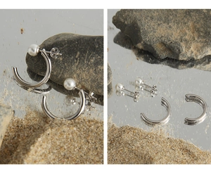 Macro view of S925 sterling silver pearl stud earring set with removable C-hoops